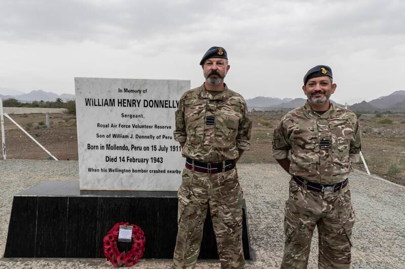 Wg Cdr Paul Taylor (L) and Flt Lt Hassan Baig attend a memorial service for British airman William Donnelly who died in a plane crash in Dhadna, Fujairah, in 1943. All photos: Antonie Robertson / The National