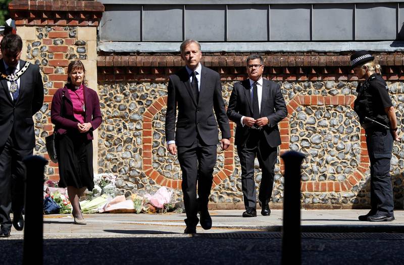 Britain's Secretary of State for Business, Energy and Industrial Strategy, Alok Sharma, and Britain's Labour MP for Reading East, Matt Rodda, are seen near the scene of reported multiple stabbings, in Reading, Britain, June 22, 2020. REUTERS