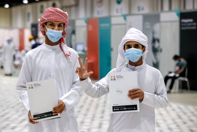 Abu Dhabi, United Arab Emirates, August 6, 2020.  Vaccine volunteers at the ADNEC volunteer facility. --Mohammad al Rajbi- 19Nasser Bina Haili- 19.  Victor Besa /The NationalSection: NAReporter:  Shireena Al Nowais