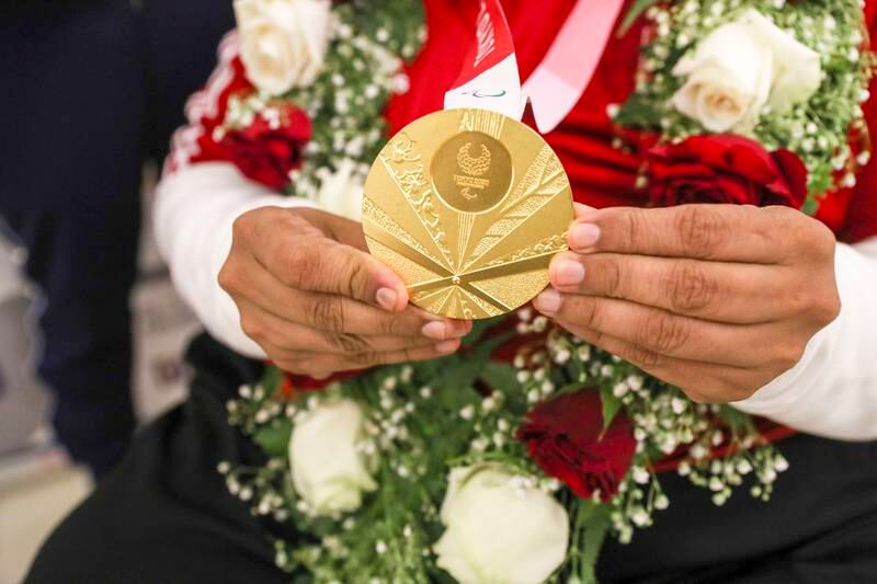 Abdulla Sultan Al Aryani shows off his gold medal.