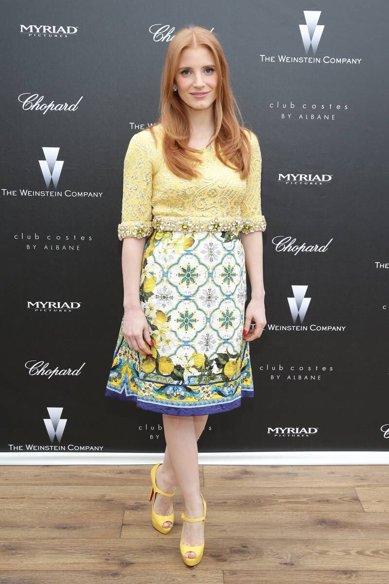 Jessica Chastain, in a yellow and green Dolce & Gabbana dress with a lemon print, attends a 'The Disappearance of Eleanor Rigby' reception during the 67th Cannes Film Festival on May 17, 2014. Getty Images