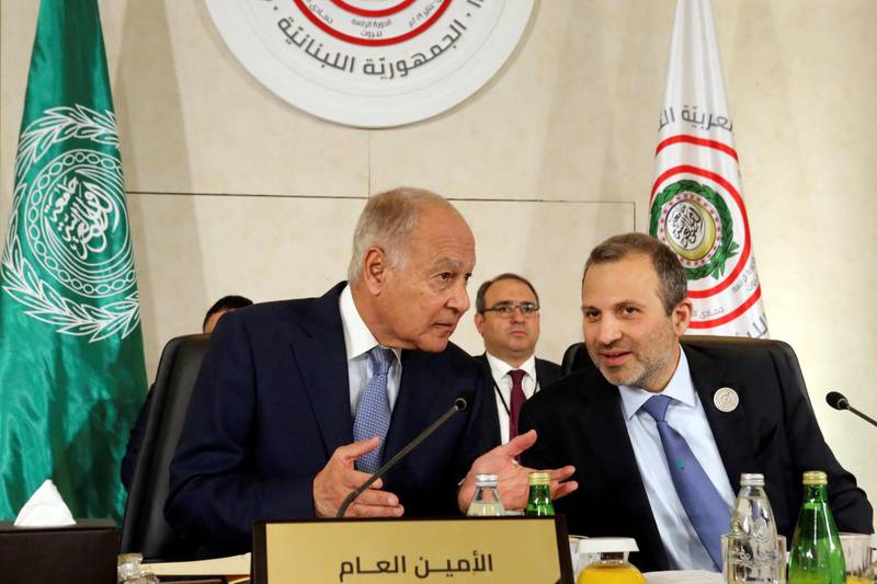 Arab League Secretary-General Ahmed Abul Gheit gestures as he talks with Lebanese Foreign Minister Gebran Bassil. Reuters