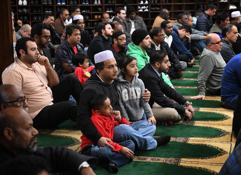 Members of the Islamic community listen during a prayer session in Los Angeles. AFP