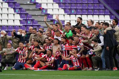 Atletico Madrid´s players celebrate after winning La Liga. AFP