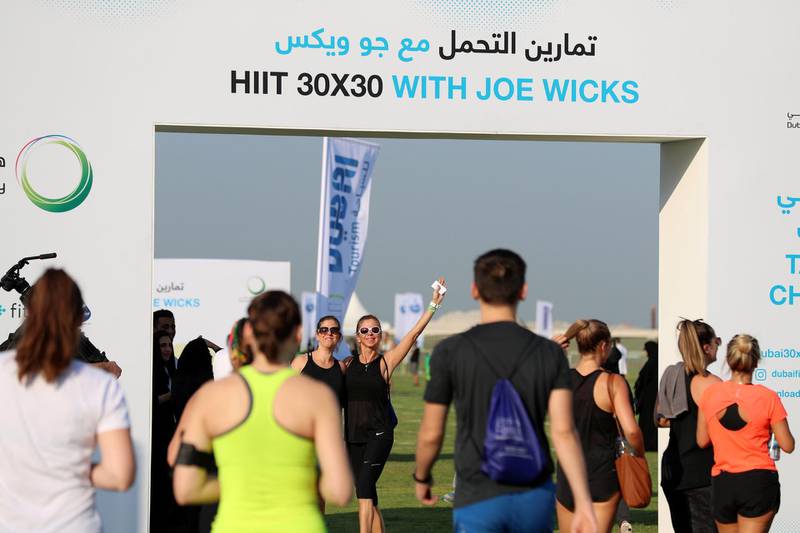Dubai, United Arab Emirates - October 26, 2019: People arrive. HIIT 30X30 with Joe Wicks. Guinness World Record attempt for the largest HIIT class. Saturday the 26th of October 2019. Skydive Dubai, Dubai. Chris Whiteoak / The National