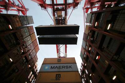 Containers are unloaded from the Maersk Majestic. Aly Song / Reuters