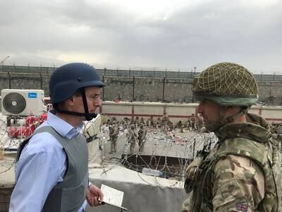 Laurie Bristow, left, Britain's ambassador to Afghanistan, during the UK evacuation effort in Kabul, Afghanistan. Reuters