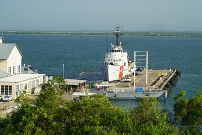 A US Navy cutter shipped docked at Guantanamo Bay.