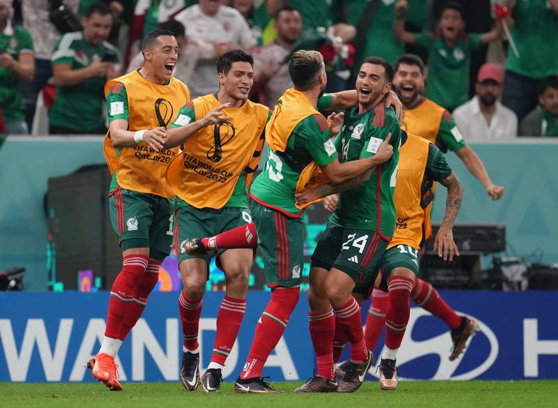 Mexico's Luis Chavez, right, celebrates scoring the second goal. PA