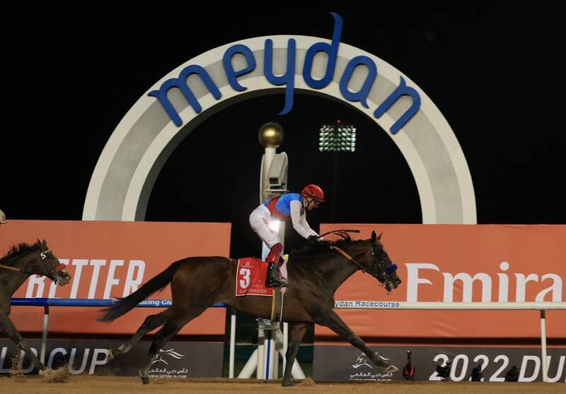 Country Grammer, ridden by Frankie Dettori, wins the Dubai World Cup. Reuters