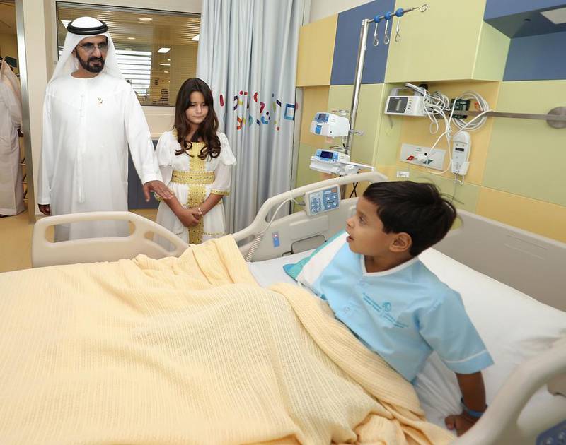 Sheikh Mohammed bin Rashid, Vice President and Ruler of Dubai, and his daughter Sheikha Al Jalila visit a young patient at Al Jalila Children’s Speciality Hospital in Al Jaddaf, Dubai. Sheikh Mohammed on Tuesday officially opened the hospital.  Wam