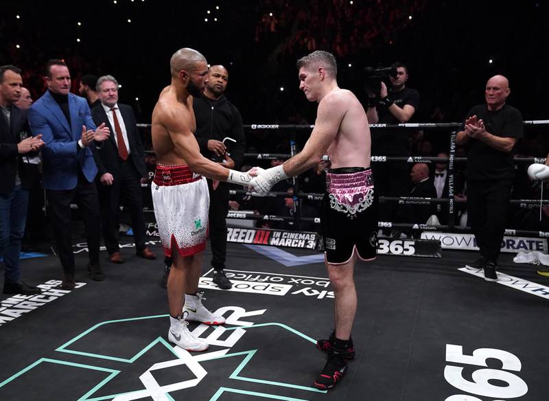 Chris Eubank Jr shakes hands with Liam Smith following their middleweight bout. PA