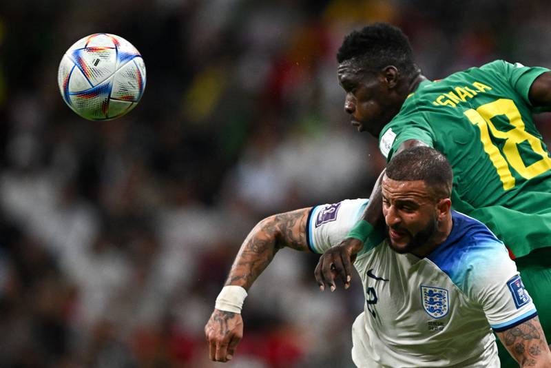Kyle Walker 7 - Lucky not to be booked for a foul on Sarr after 36. The whole defence was pressured by Senegal, but it all changed after the opening goal. 

AFP
