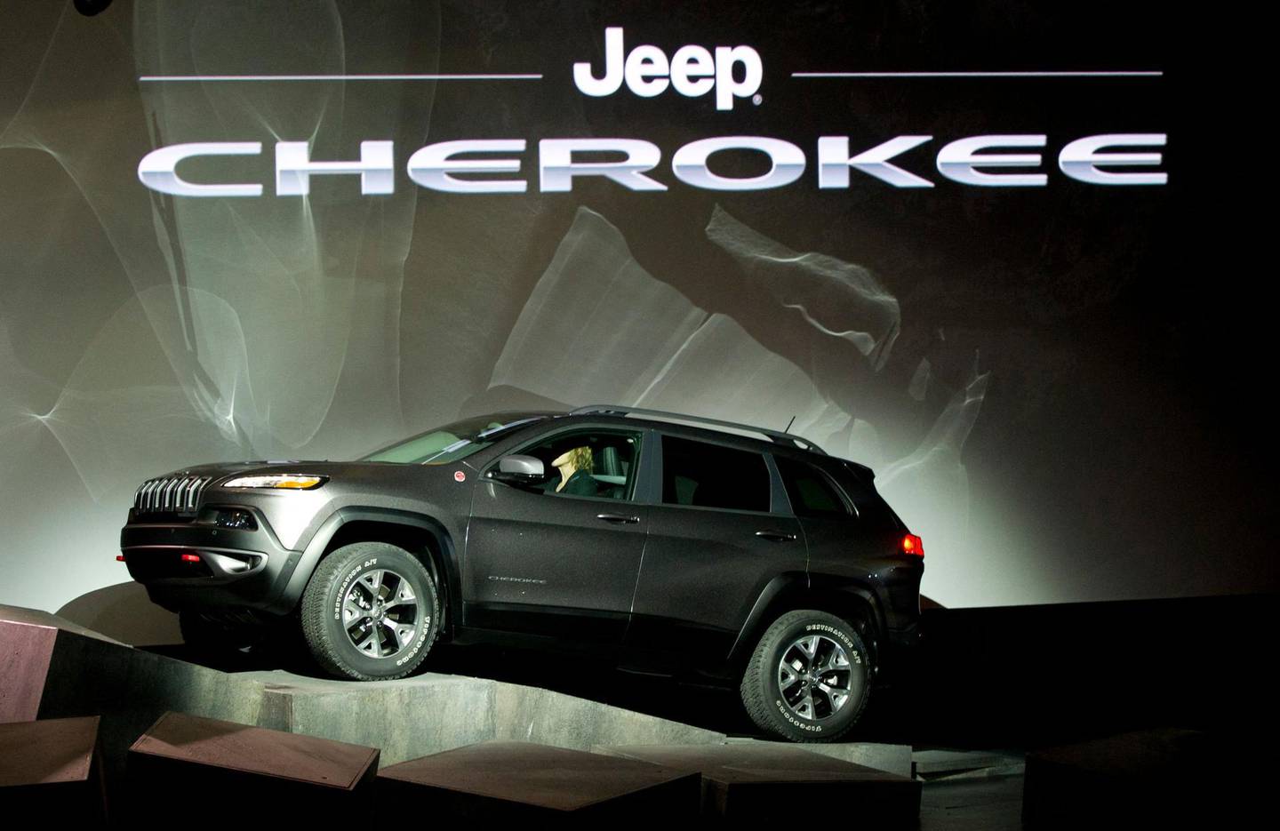 (FILES) In this file photo s new Jeep Cherokee makes its way over obstacles during a media conference at the New York International Auto show March 27, 2013 in New York. On February 22 the Cherokee Nation said it has asked for its tribal name to be removed as a nameplate from Jeep sport utility vehicles and called for a dialogue with the automaker on "cultural appropriateness."
The Native American group's principal chief Chuck Hoskin Jr asked Jeep's parent firm Stellantis "he does not condone" the use of the name Cherokee on the vehicles, according to a statement.
 / AFP / Don EMMERT
