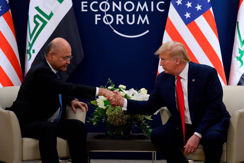 US President Donald Trump speaks with Iraqi President Barham Salih during a bilateral meeting at the World Economic Forum in Davos, Switzerland. AFP