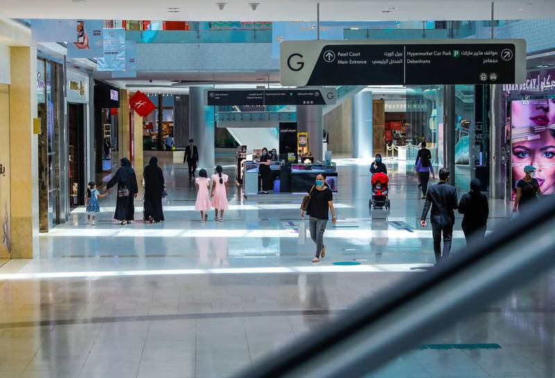 Abu Dhabi, United Arab Emirates, August 19, 2020.  Yas Mall keeping up with DCT’s Covid-19 precautionary measures “Go Safe”, for instance, they have a robot taking the temperature of customers, an automatic elevator sanitising machine.Victor Besa /The NationalSection:  NAReporter:  Haneen Dajani