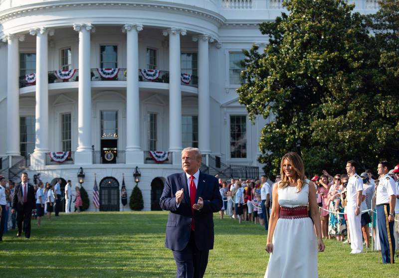 US President Donald Trump and First Lady Melania Trump arrive at the South Lawn of the White House in Washington, DC, July 4. Saul Loeb/ AFP