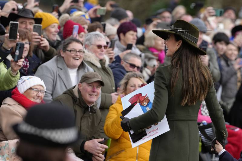 Kate, Princess of Wales smiles at the crowd after attending the Christmas Day service at St Mary Magdalene Church in Sandringham, England. AP