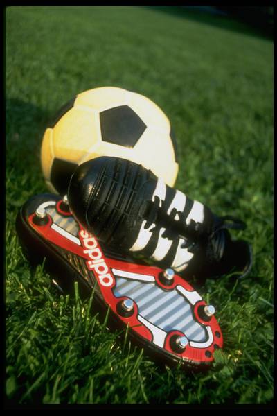 Pair of Adidas Predator high performance soccer shoes w. cleats next to soccer ball.  (Photo by Les Jorgensen/The LIFE Images Collection via Getty Images/Getty Images)