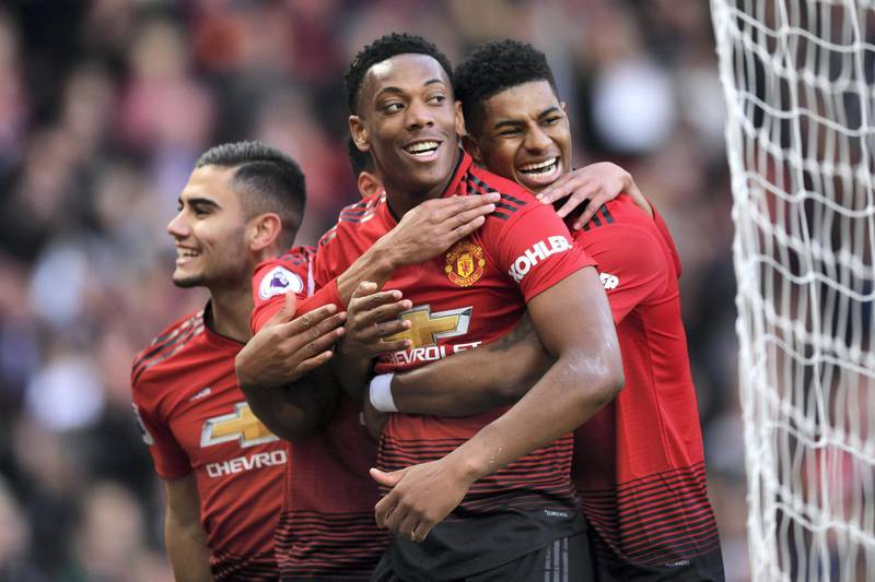 MANCHESTER, ENGLAND - MARCH 30: Anthony Martial of Manchester United celebrates with teammates after scoring his team's second goal during the Premier League match between Manchester United and Watford FC at Old Trafford on March 30, 2019 in Manchester, United Kingdom. (Photo by Shaun Botterill/Getty Images)