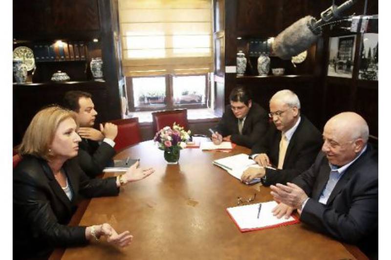 Ahmed Qurei, bottom right, sits alongside senior Palestinian negotiator Saeb Erekat and opposite Israeli foreign minister Tzipi Livni, during peace talks in May 2008.