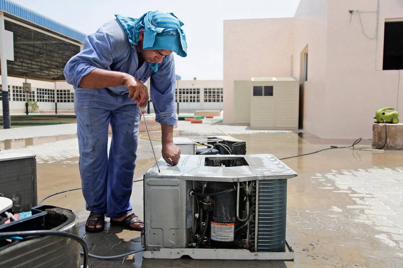 Sharjah, UAE, August 21, 2013:

The Al Arqam school is gearing up for the school year. Today, The National paid the school a visit to see exactly what maintenance was going on. 

Seen here is Junaid cleaning air conditioning units. 


Lee Hoagland/The National. *** Local Caption ***  LH2108_AL_ARQAM_SCHOOL_006.JPG