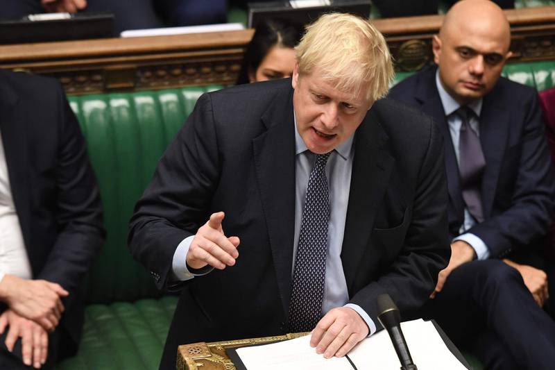A handout picture released by the UK Parliament shows Britain's Prime Minister Boris Johnson making a statement in the House of Commons in London on October 19, 2019. British MPs gather Saturday for a historic vote on Prime Minister Boris Johnson's Brexit deal, a decision that could see the UK leave the EU this month or plunge the country into fresh uncertainty.  - RESTRICTED TO EDITORIAL USE - MANDATORY CREDIT " AFP PHOTO / UK PARLIAMENT / JESSICA TAYLOR  " - NO USE FOR ENTERTAINMENT, SATIRICAL, MARKETING OR ADVERTISING CAMPAIGNS - EDITORS NOTE THE IMAGE HAS BEEN DIGITALLY ALTERED AT SOURCE TO OBSCURE VISIBLE DOCUMENTS
 / AFP / UK PARLIAMENT / JESSICA TAYLOR / RESTRICTED TO EDITORIAL USE - MANDATORY CREDIT " AFP PHOTO / UK PARLIAMENT / JESSICA TAYLOR  " - NO USE FOR ENTERTAINMENT, SATIRICAL, MARKETING OR ADVERTISING CAMPAIGNS - EDITORS NOTE THE IMAGE HAS BEEN DIGITALLY ALTERED AT SOURCE TO OBSCURE VISIBLE DOCUMENTS

