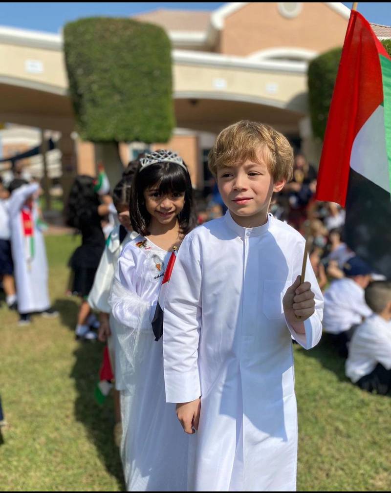 Pupils at Repton School Dubai raise the flag on UAE Flag Day.