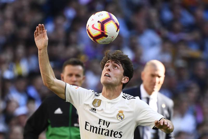 Real Madrid's Spanish defender Alvaro Odriozola eyes the ball during the Spanish league football match between Real Madrid CF and RC Celta de Vigo at the Santiago Bernabeu stadium in Madrid on March 16, 2019. / AFP / GABRIEL BOUYS                    
