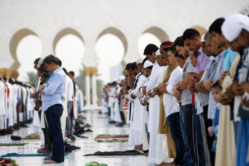 Worshippers perform Eid Al Fitr prayers at Sheikh Zayed Grand Mosque in Abu Dhabi. Christopher Pike / The National