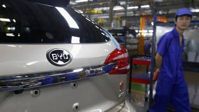 BYD, the world's largest electric vehicle maker last year, is set to benefit from the latest Chinese regulation for fewer petrol-fueled cars. Bobby Yip / Reuters