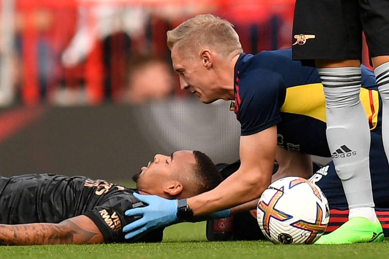 Arsenal's Brazilian striker Gabriel Jesus is treated for a head injury. Reuters