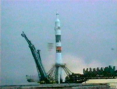 On October 31, 2000, a cloud of smoke surrounds the Soyuz rocket seconds before liftoff from the Baikonur Cosmodrome in Kazakstan, carrying the first residents of the International Space Station. Two days later, U.S. astronaut Bill Shepherd, and Russian cosmonauts Sergei Krikalev, and Yuri Gidzenko arrived at the space station. (NASA via AP, File)