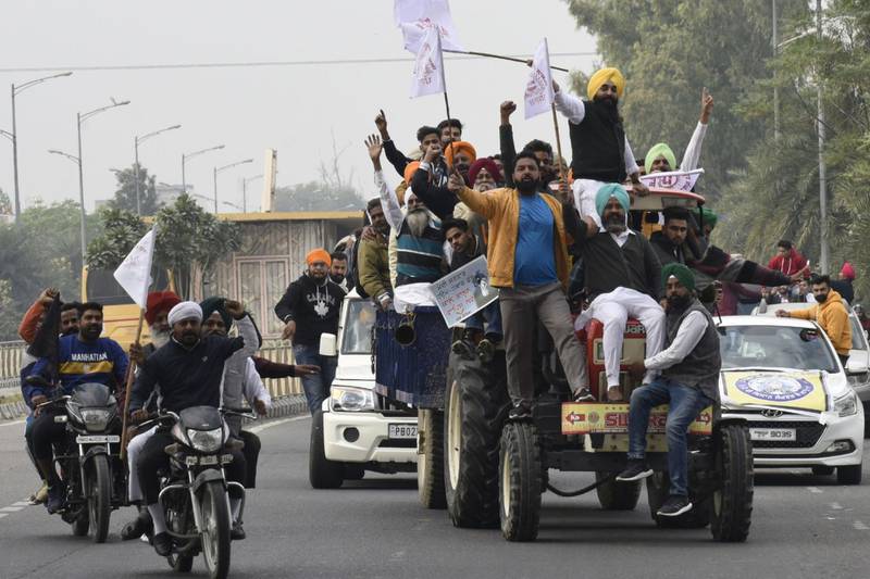 Activists of National Students' Union of India (NSUI) shout slogans against India's Prime Minister Narendra Modi during a protest in support of a nationwide general strike called by farmers to protest against the recent agricultural reforms in Amritsar.   AFP