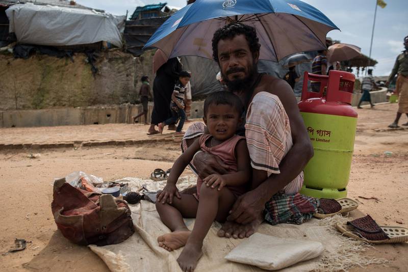 A Rohingya refugee and his child in a camp near Cox's Bazar, Bangladesh, August 11 2018. Campbell MacDiarmid for The National