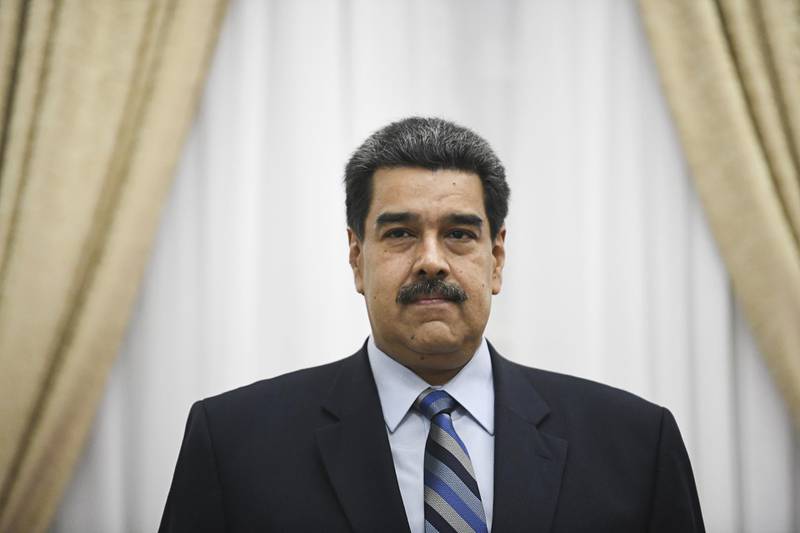 Nicolas Maduro, Venezuela's president, waits to greet Michelle Bachelet, high commissioner for human rights at the United Nations, not pictured, at Miraflores Palace in Caracas, Venezuela, on Friday, June 21, 2019. Hundreds of protesters gathered in front of the UN's Venezuela office to denounce what they say are the myriad rights abuses by the regime of President Maduro, including extrajudicial killings, and has held hundreds of political prisoners and detained journalists. Photographer: Carlos Becerra/Bloomberg