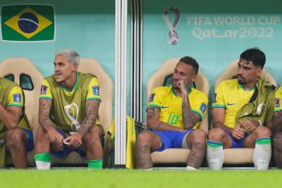 Neymar on the bench after being replaced. PA
