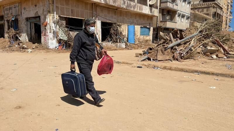 A resident leaves Derna with a few possessions. Ismaeel Naar / The National