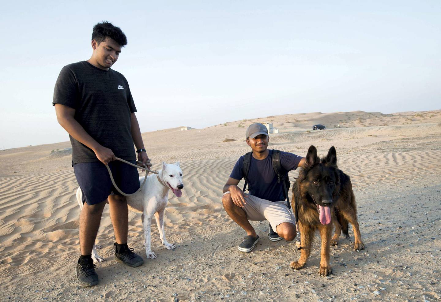 UMM ALQUWAIN, UNITED ARAB EMIRATES - Volunteers donate time to walk the dogs at the Stray Dog Centre, Umm AL Quwain.  Ruel Pableo for The National for Evelyn Lau's story