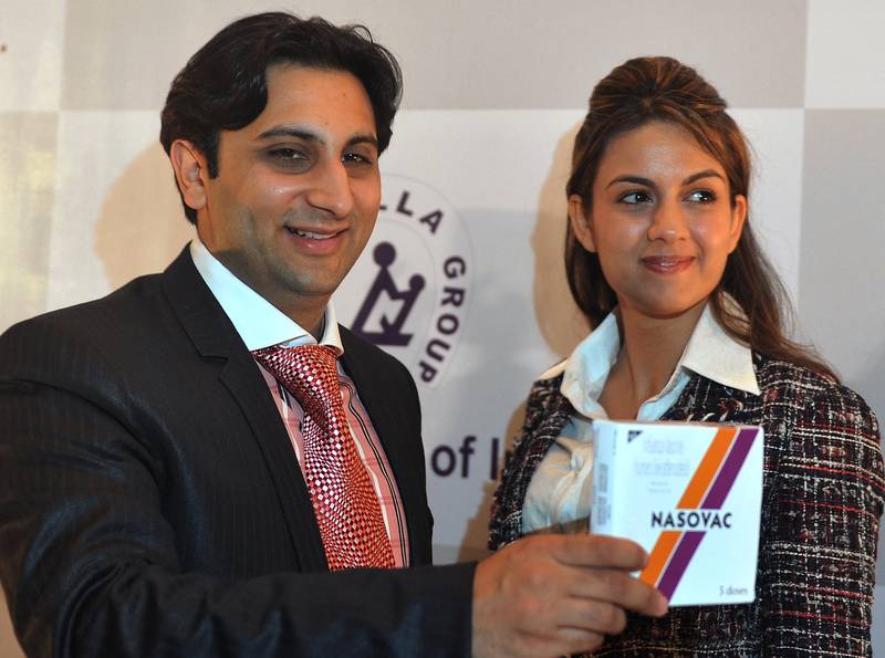 Serum Institute of India's Executive Director Adar Poonawalla and his wife Natasha launch the country's first nasal H1N1 vaccine, 'Nasovac', at a news conference in Mumbai on July 14, 2010. AFP