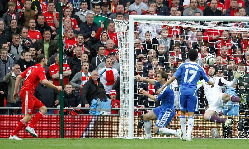 Liverpool striker Andy Carroll has his attempt saved on the line by Chelsea goalkeeper Petr Cechduring the FA Cup final  at Wembley Stadium on May 5, 2012. AFP