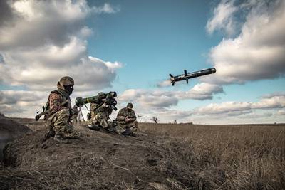 Ukrainian soldiers use a launcher with US Javelin missiles during military exercises in the Donetsk region. AP Photo