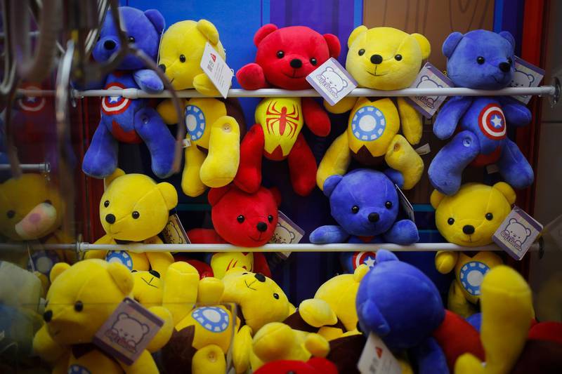 Chinese-made teddy bears carrying American hit movie Avengers characters are displayed inside an arcade game at a shopping mall in Beijing, Wednesday, July 11, 2018. China's government has criticized the latest U.S. threat of a tariff hike as "totally unacceptable" and vowed to retaliate in their escalating trade war. The Commerce Ministry on Wednesday gave no details, but Beijing responded to last week's U.S. tariff hike on $34 billion of imports from China by increasing its own duties on the same amount of American goods. (AP Photo/Andy Wong)