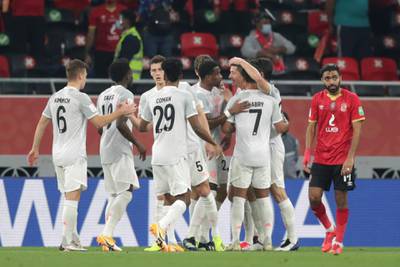 Bayern's Robert Lewandowski celebrates with teammates after scoring the opening goal. AP