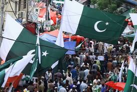 Pakistanis dance and wave flags on 75th independence day
