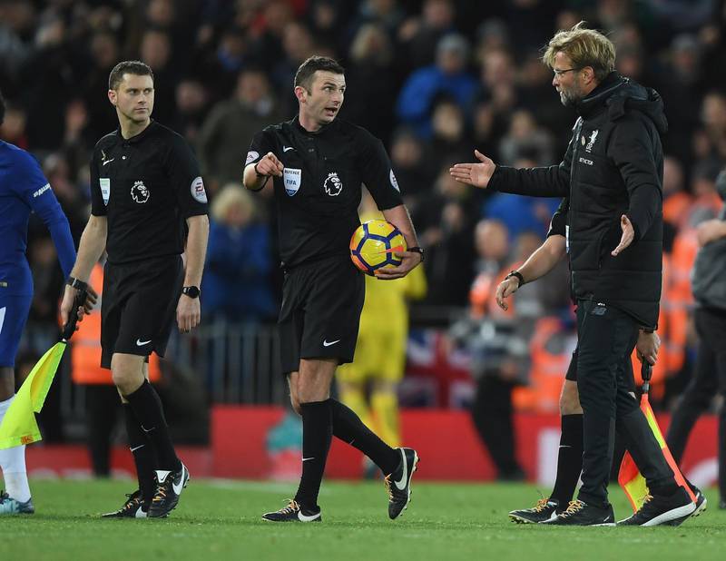 LIVERPOOL, ENGLAND - NOVEMBER 25:  Jurgen Klopp, Manager of Liverpool confronts referee Michael Oliver after the Premier League match between Liverpool and Chelsea at Anfield on November 25, 2017 in Liverpool, England.  (Photo by Shaun Botterill/Getty Images)