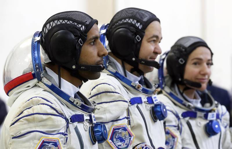 Al Mansouri, Skripochka and NASA astronaut Jessica Meir attend their final exams. EPA