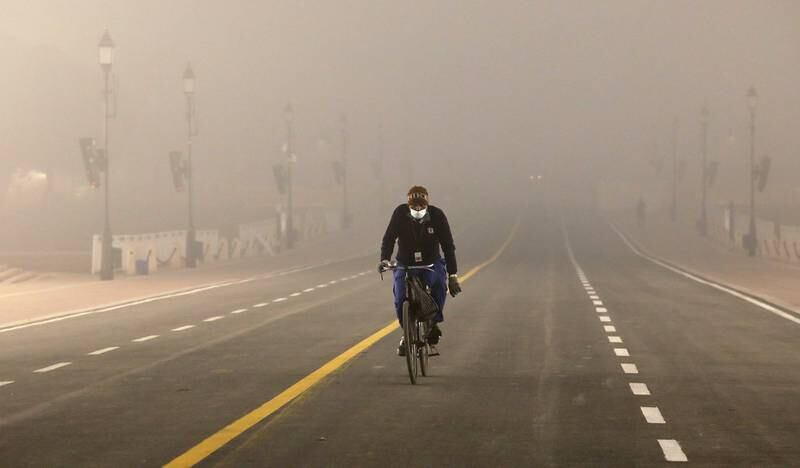 A foggy morning ride in Delhi last week. EPA