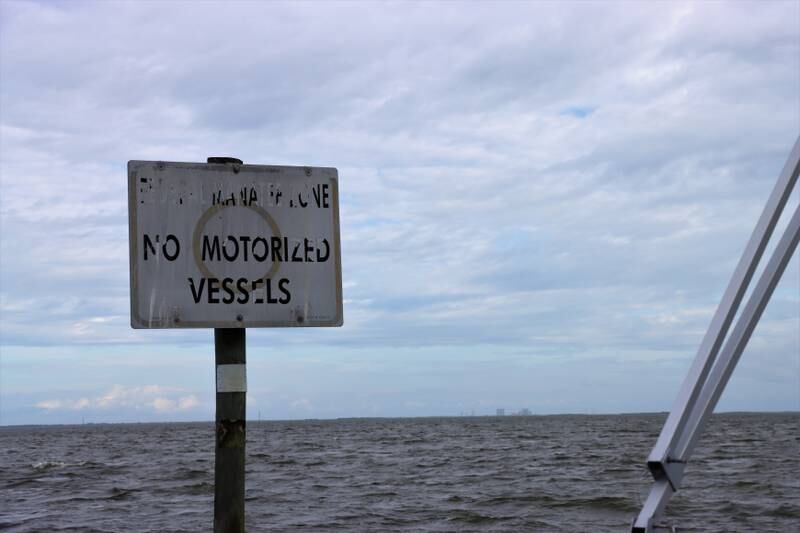 A 'no motorised vessels' sign in Banana River to help protect wildlife in the area