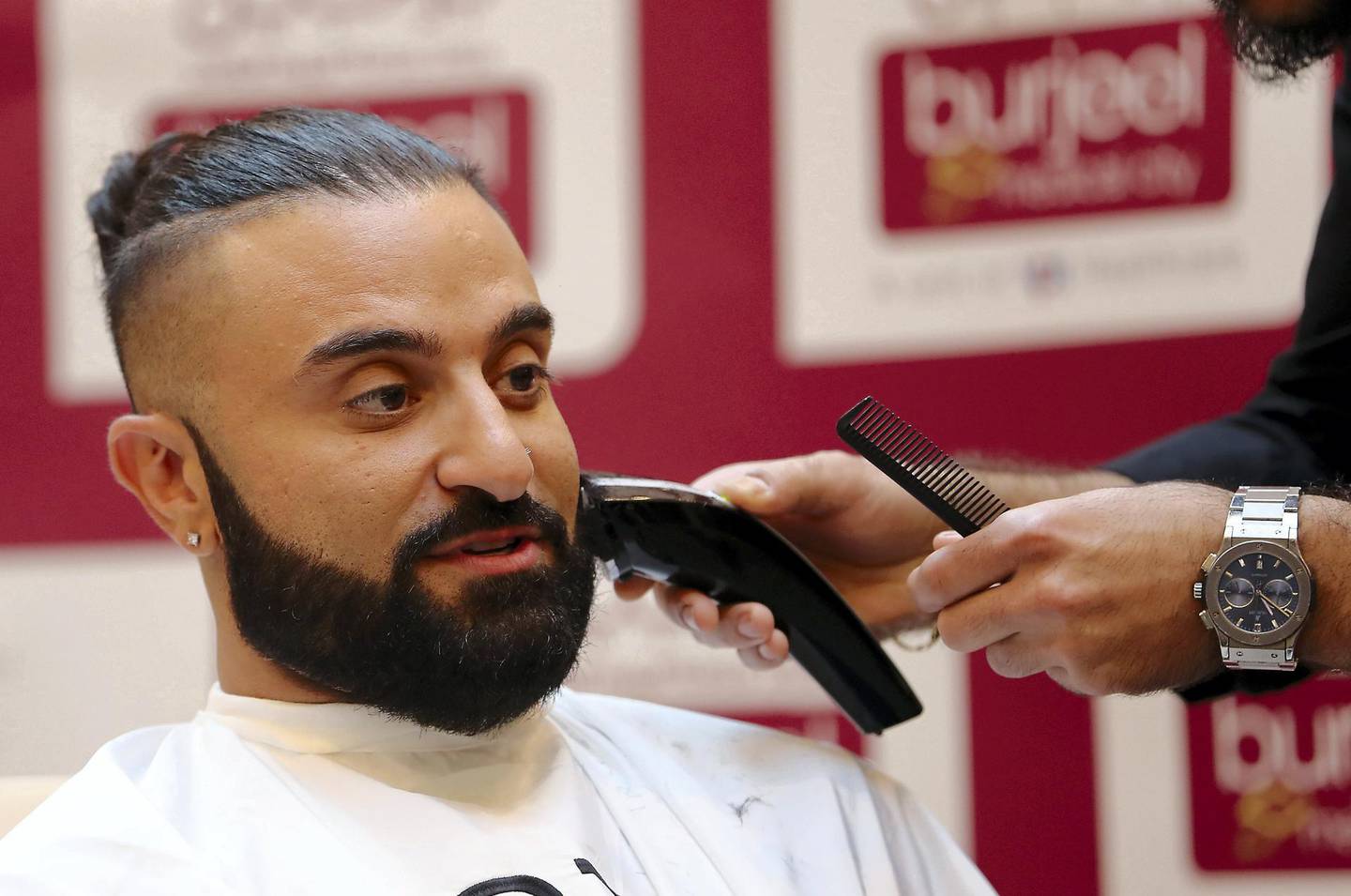 ABU DHABI , UNITED ARAB EMIRATES ,  November 21 , 2018 :- Kris Fade , RJ Virgin Radio Dubai doing a Movember shave to raise awareness of men's health issues held at Burjeel Day Surgery Center on Reem Island in Abu Dhabi. ( Pawan Singh / The National )  For News. Story by Adam Workman